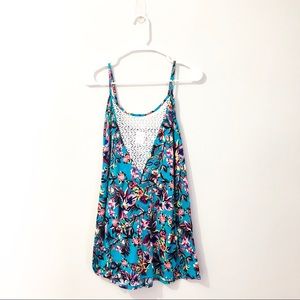 Floral pattern tank top with crochet/lace front.
